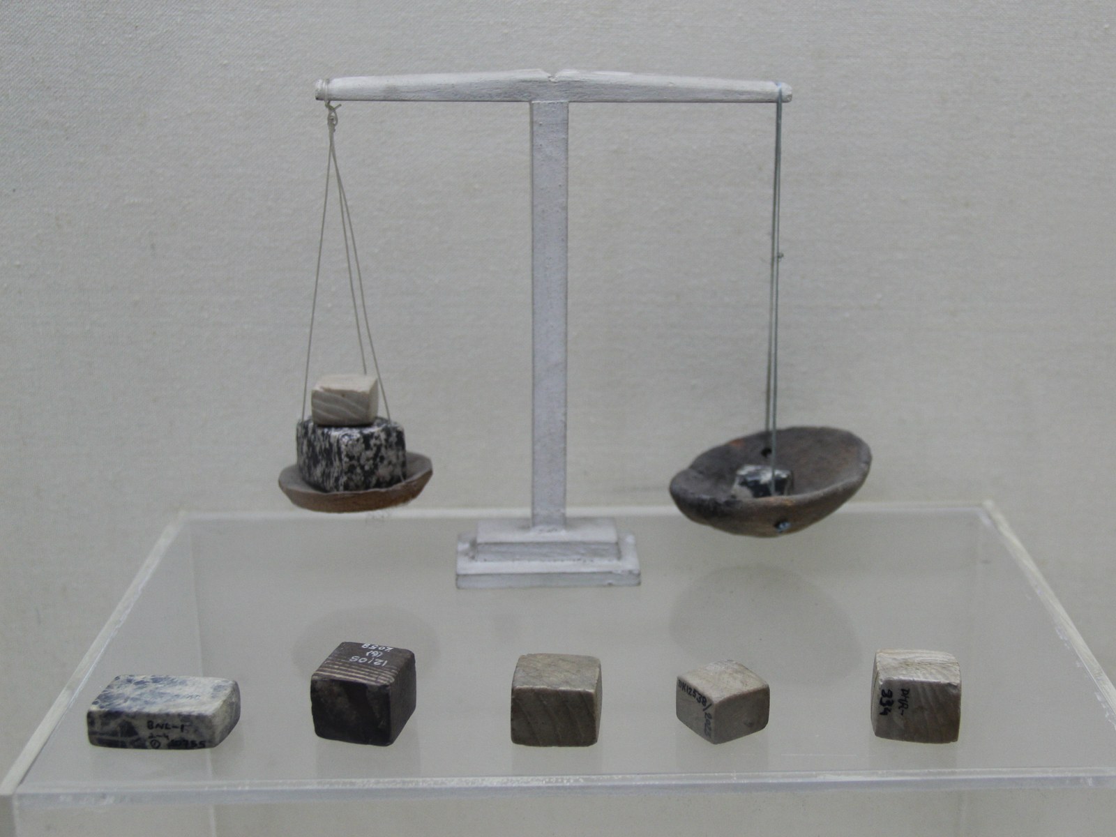 Harappan balance scale with cubical stone weights